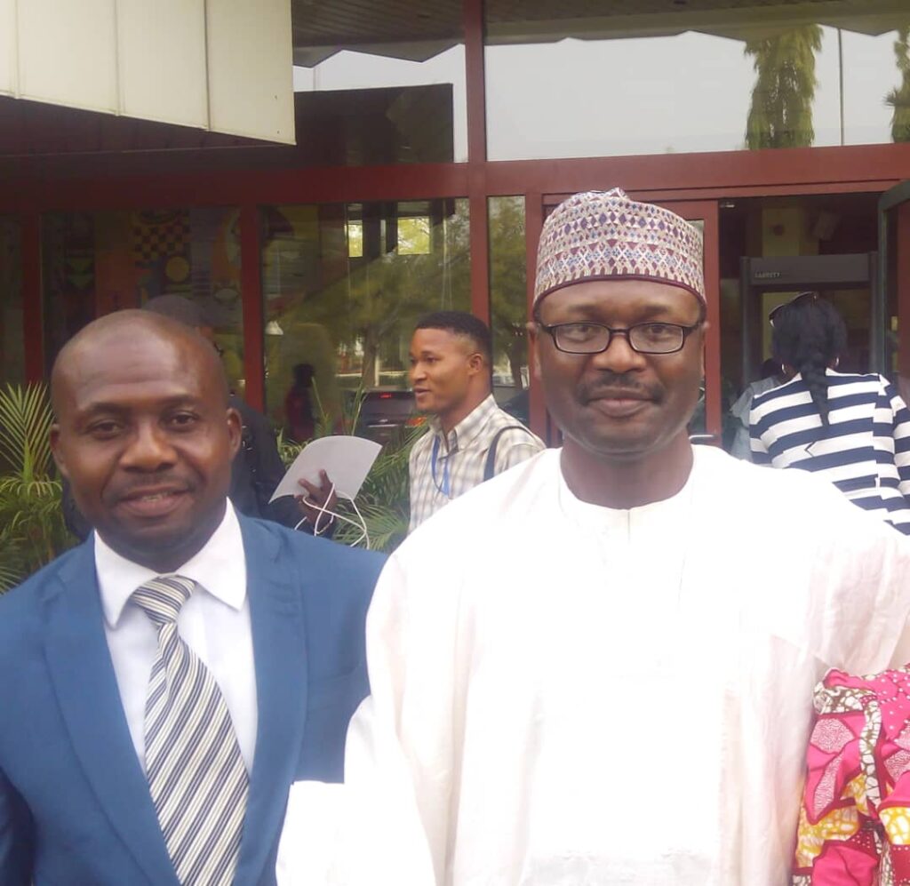 With the INEC Chairman, Prof. mamud Yakubu, after a strategic retreat for Election experts in Transcolp Hilton Abuja 2022.