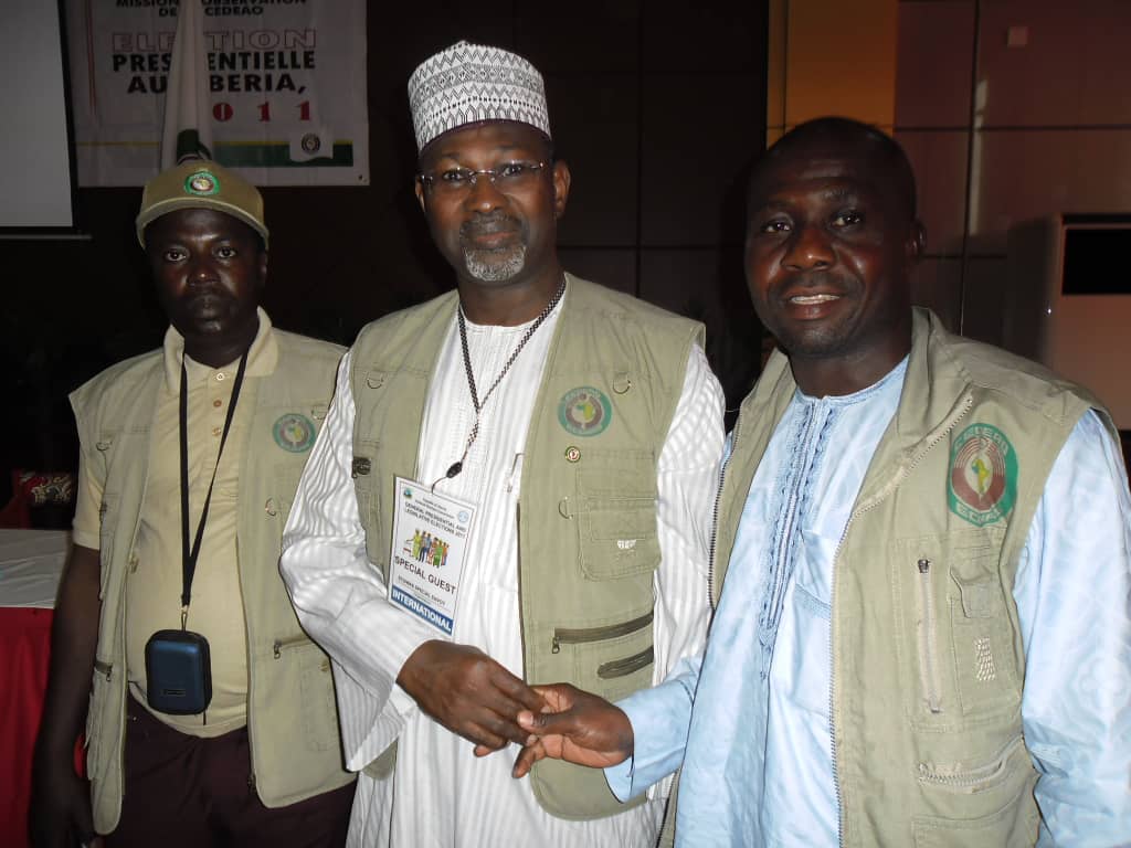 With the former INEC chairman, during one of the ECOWAS election observation Mission